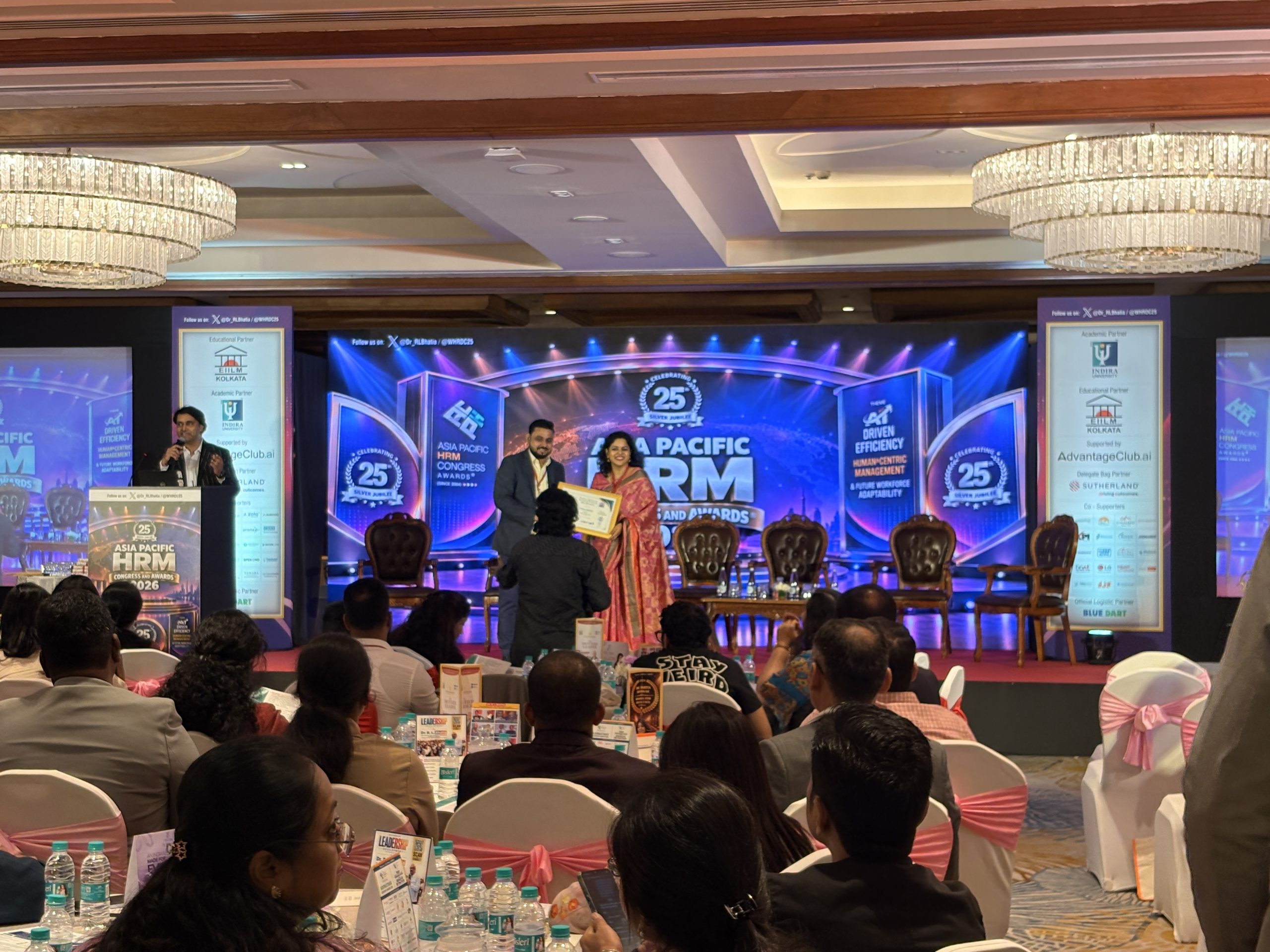 Sushma Tripathy receiving an award