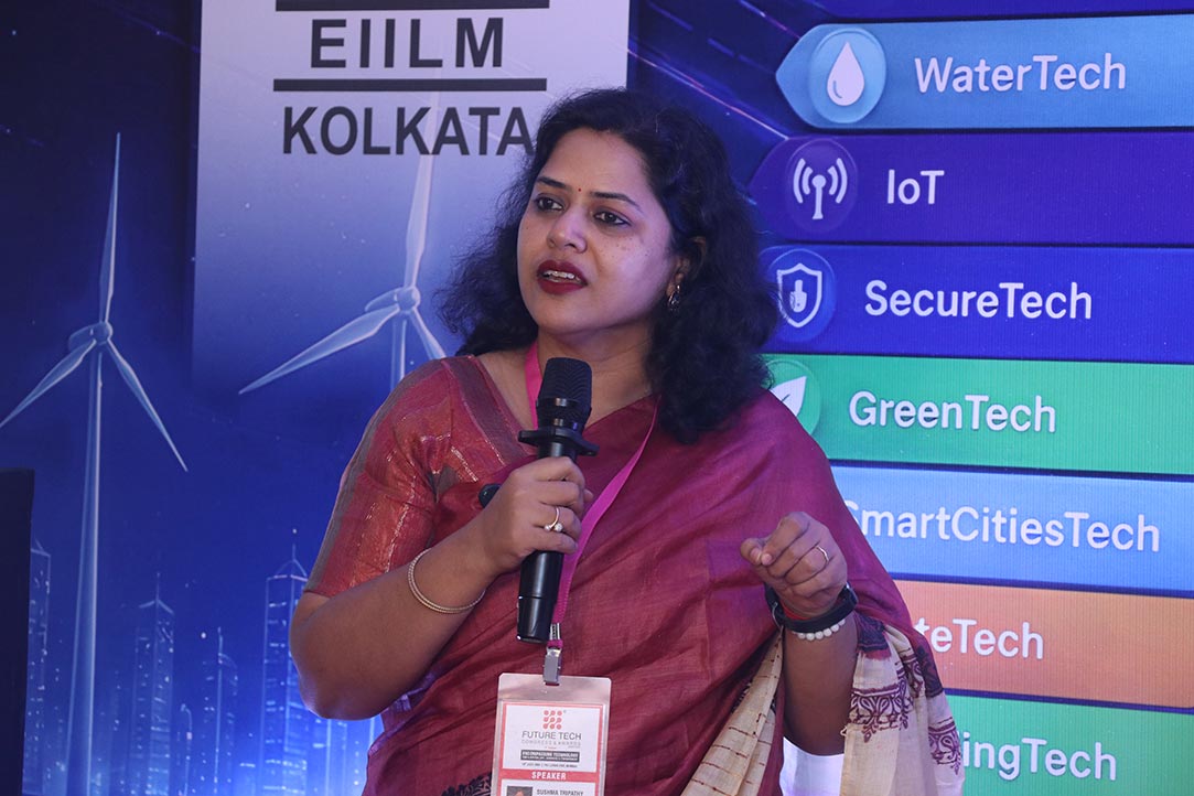 Sushma Tripathy speaking on stage
